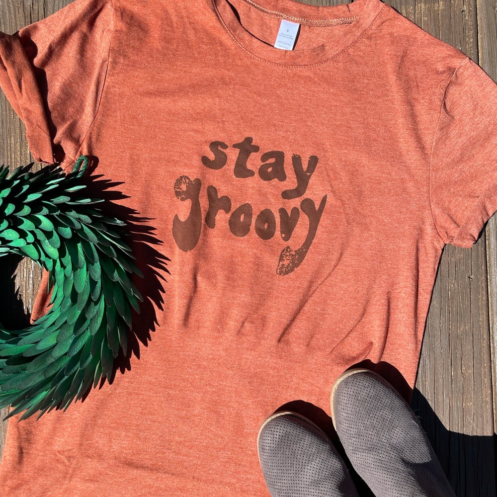 Stay groovy T shirt. Item is handmade. Made to order!